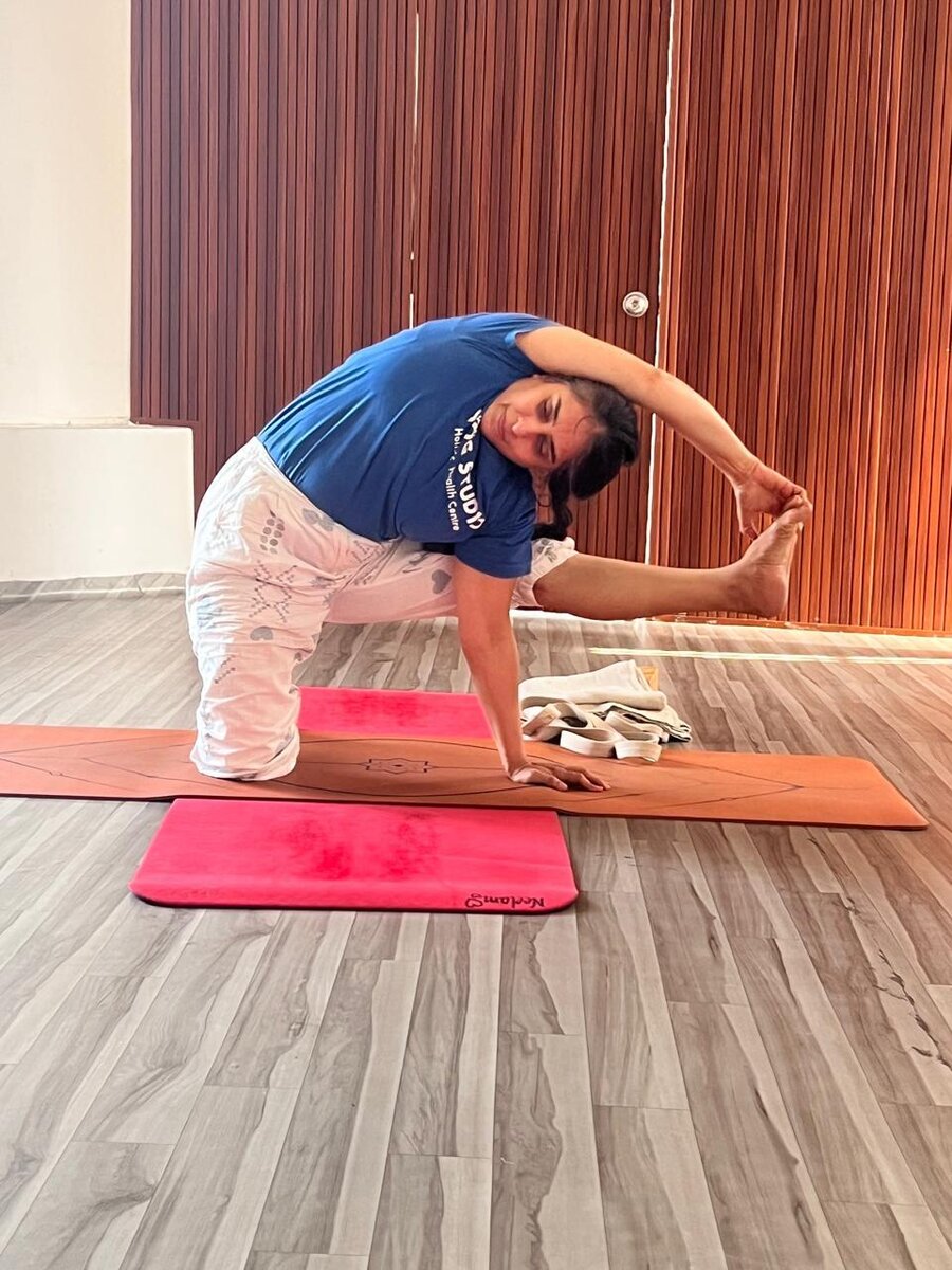 Yoga pose demonstration at YogStudio Kharghar