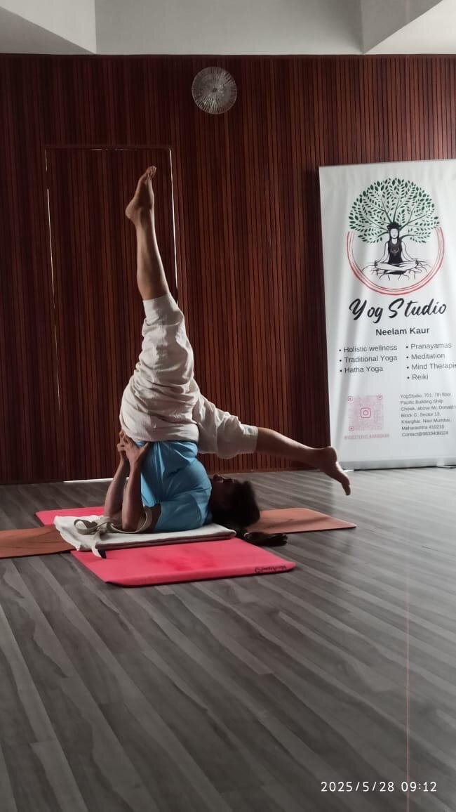 Yoga pose demonstration at YogStudio Kharghar