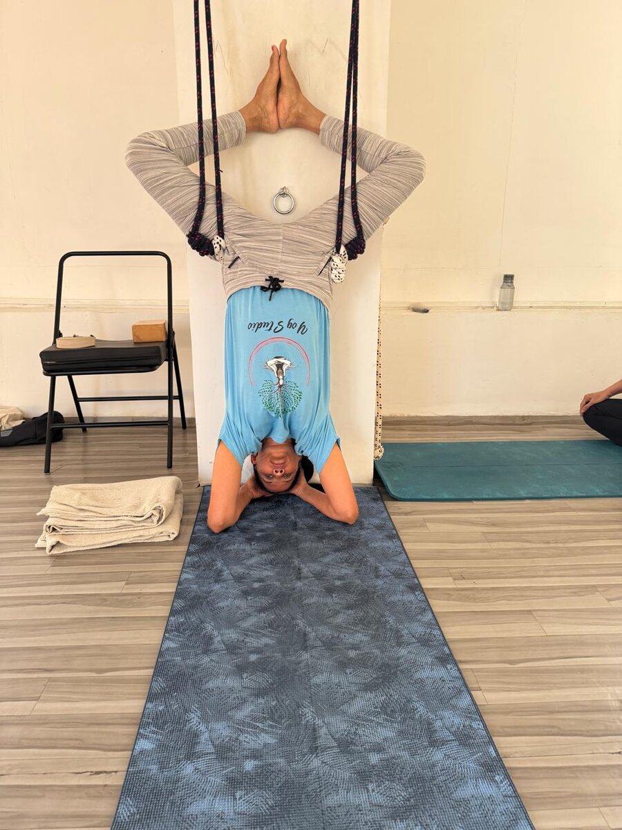 Yoga pose demonstration at YogStudio Kharghar