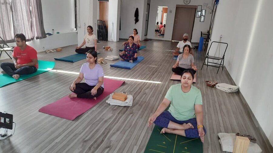 Students in seated meditation at YogStudio Kharghar