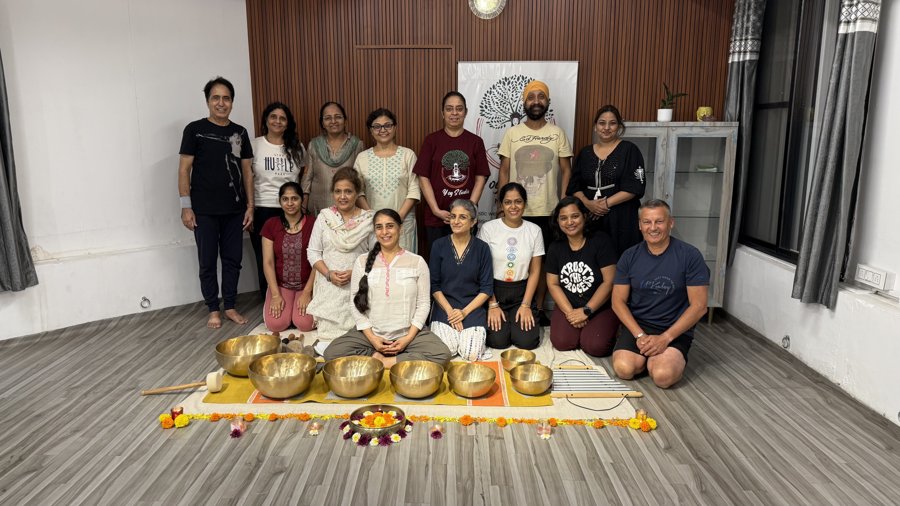 Group sound healing session with singing bowls at YogStudio Kharghar